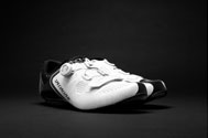 Specialized expert pro carbon road cycling shoe on a black studio backdrop