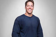 commercial portrait of a student against white seamless